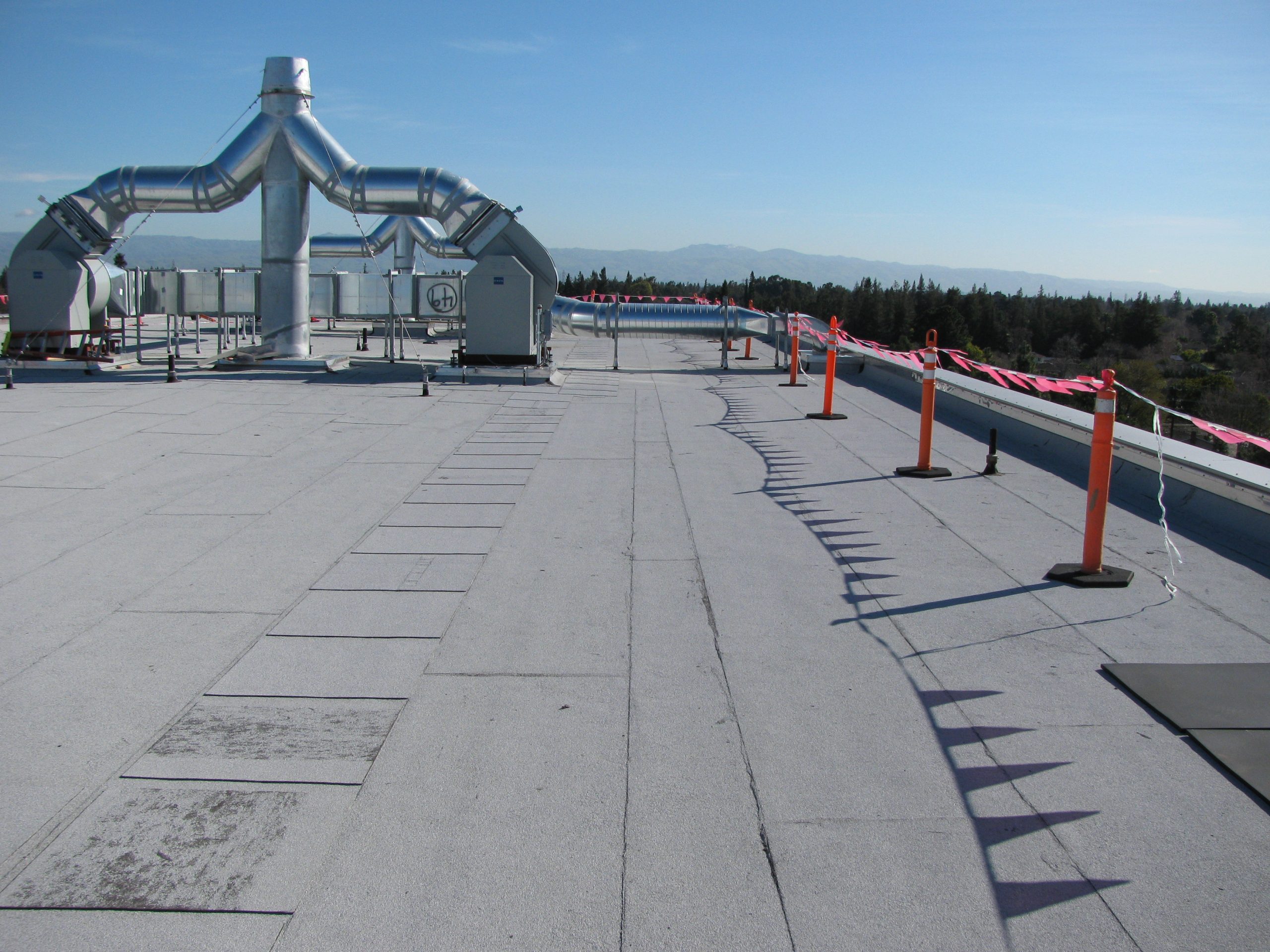 Occupied Building Reroofing — commercial roofing in Kansas City, MO